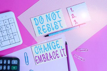 Text sign showing Do Not Resist Change Embrace It. Business photo showcasing Be open to changes try new things Positive Writing equipments and computer stuffs placed above colored plain table