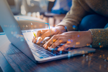 Businessman using a laptop computer with technology cybersecurity and privacy concept. protection and safe data for global network security.