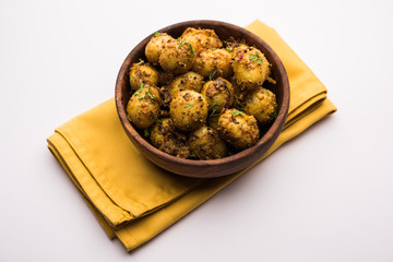 Canvas Print - Jeera Aloo - Potatoes Flavoured With Cumin seeds and spices. popular Indian main course recipe. served in a bowl. selective focus