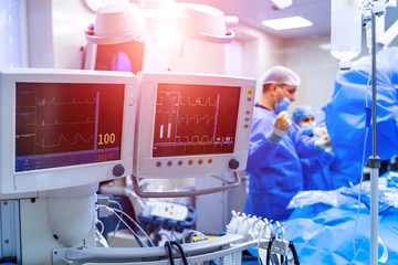 Medical devices, Interior hospital design concept. Interior of operating room in modern clinic, screen with tests closeup