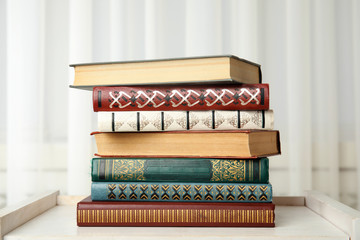 Collection of different books on table indoors