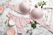 Flat lay composition with women's underwear on marble background