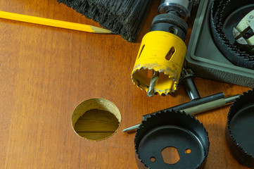 Tool for cutting round holes in wood