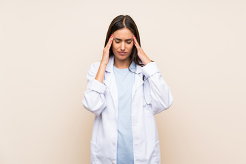 Wall Mural - Young doctor woman over isolated background unhappy and frustrated with something. Negative facial expression