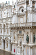 Doge`s Palace or Palazzo Ducale, Venice, Italy. It is famous landmark of Venice. Nice ornate facade of old Doge`s Palace with statues and balcony.