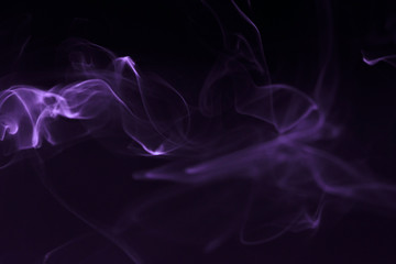 Colourful smoke fumes in different patterns on a black isolated background. Print for t-shirt.