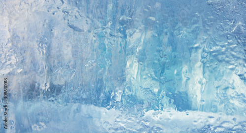 Ice background. The frozen texture of the water