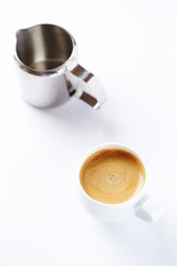 Cup of coffee on white background.  Copy space.