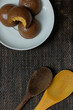 Honey bread cookie, typical Brazilian candy with cup of coffee on wooden background