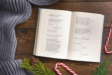 Open Book And Christmas Decor, On Wooden Background. Flat Lay, Top View, Copy Space.