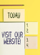 Handwriting text Visit Our Website. Conceptual photo visitor who arrives at web site and proceeds to browse Colored empty papers with copy space on the yellow background table