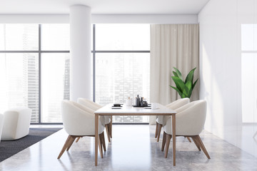 Luxury white panel dining room interior