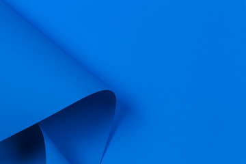 Abstract geometric shape blue color paper background