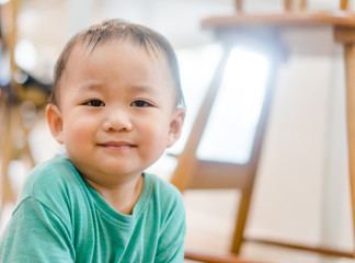 Wall Mural - Little asian toddler boy need a poo at home.Child development concept.