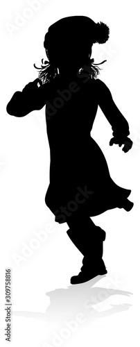 A child in silhouette playi...