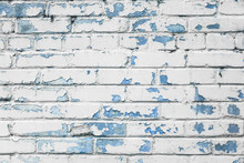 Blue And White Brick Wall Texture Background. Old Weathered And Cracked Bricks Close Up. Copy Space