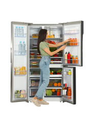 Wall Mural - Young woman taking juice from refrigerator on white background