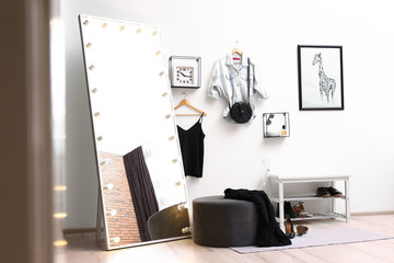 Poster - Large mirror with light bulbs in stylish room interior