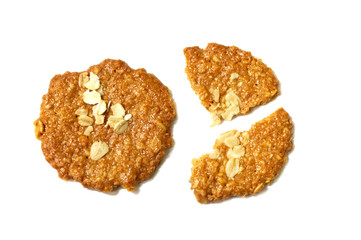 Biscuits homemade Oatmeal flavoured and Thin style. Broken of crunchy delicious sweet meal and useful cookies. Isolated on white background.