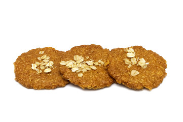 Biscuits homemade Oatmeal flavoured and Thin style. Stack of crunchy delicious sweet meal and useful cookies. Isolated on white background.