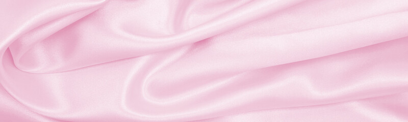 Wall Mural - Smooth elegant pink silk or satin texture as wedding background. Luxurious background design