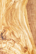 © Liliya Trott - Beautiful olive wood texture background, top view