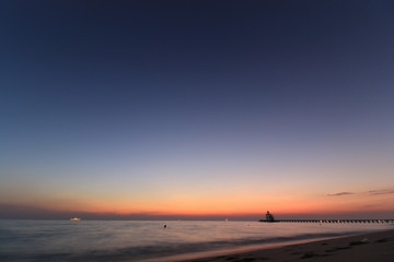 The beautiful light of the sunset at the sea. Mae Ramphueng Beach, Taphong Subdistrict, Mueang Rayong District, Rayong Province, Thailand