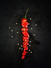 Red Chili Peppers On Black Background