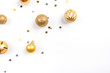 © Anna - Festive white background with gold Christmas decorations. Flat lay, top view. Copy space for text.