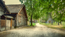 Riga,  Latvia, Panorama Old Wooden Village With Residential Buildings, A Chapel In The Forest Of The Ethnographic Museum In The Open Air 