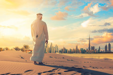Arab Man Standing Front Dubai Skyline In The Desert Of UAE