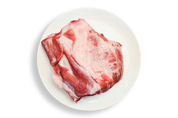 Raw meat in plate on white background