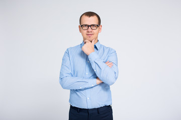 Wall Mural - portrait of businessman and copy space over gray background