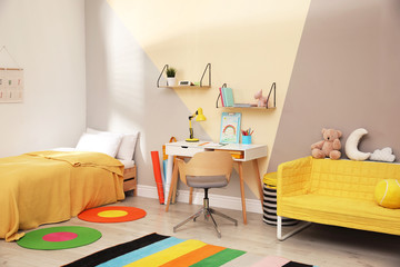 Poster - Stylish child room interior with comfortable bed and desk