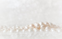 Nature White String Of Pearls On A Sparkling Background In Soft Focus, With Highlights