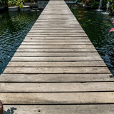 Fototapeta Pomosty - Small bridge in garden