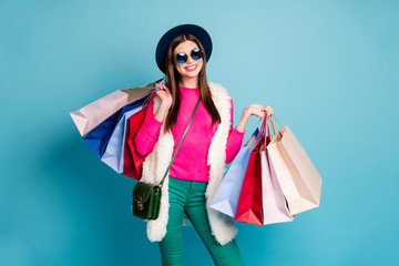 Poster - Portrait of her she nice-looking attractive cheerful cheery fashionista brown-haired girl spending free time buying addict isolated on bright vivid shine vibrant green blue turquoise color background