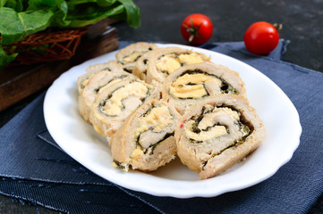 Wall Mural - Baked turkey rolls with spinach, mozzarella on plate. Healthy tasty lunch. New Year and Christmas appetizer.