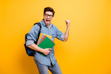 Photo Of Cheerful Excited Crazy Man Saying Yeah Screaming Passing Exam With Satchel Behind Expressing Emotions Isolated Vivid Color Background