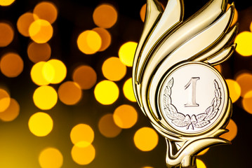 Wall Mural - gold award trophy for the winner of a competition