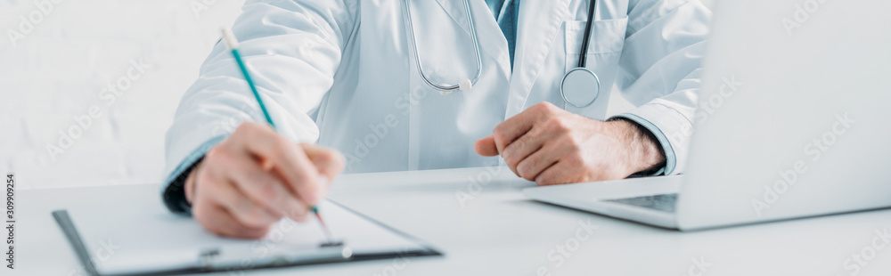 cropped view of doctor writing prescription on clipboard, panoramic shot - obrazy, fototapety, plakaty 