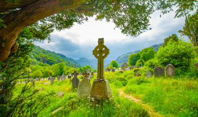 Wall Mural - Old irish celtic cemetery in Glendalough