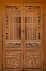 Ornately carved wooden doors