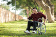 © chayathon2000 - Asian Young Man sitting on the wheelchair in the park hospital