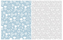 Cute Hand Drawn Floral Seamless Vector Patterns. White Flowers And Twigs Isolated On A Light Blue And Gray Backgrounds. Infantile Style Abstract Garden Design. Pastel Color Floral Repeatable Print.