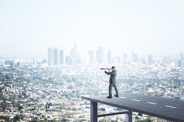 Canvas Print - Businessman standing on end road