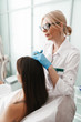 Photo of women getting mesotherapy treatment in head