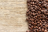 Fototapeta Kuchnia - coffee beans on wooden background