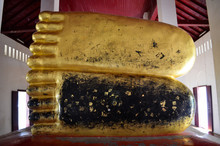 Golden Foot Of Buddha Statue At Wat Phra That Chae Haeng ,Nan Province,Thailand.