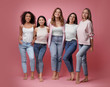 © New Africa - Group of women with different body types on pink background
